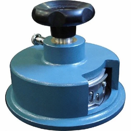 Round GSM sample cutter with hand knob and metal cutting assembly